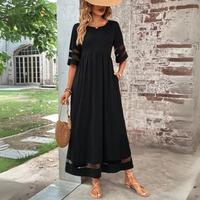 Elegant ruched knit midi dress with flowy skirt